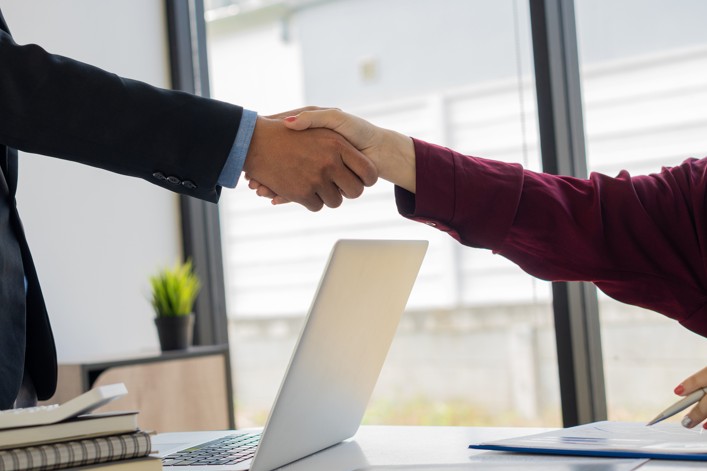 Handshake in an office